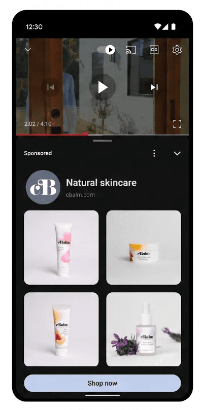 Google ad format on a mobile video: a paused YouTube clip with a sponsored "Natural skincare" product carousel from cBalm below it, showing four skincare items and a "Shop now" button. Google ad format on a mobile video: a paused YouTube clip with a sponsored "Natural skincare" product carousel from cBalm below it, showing four skincare items and a "Shop now" button.